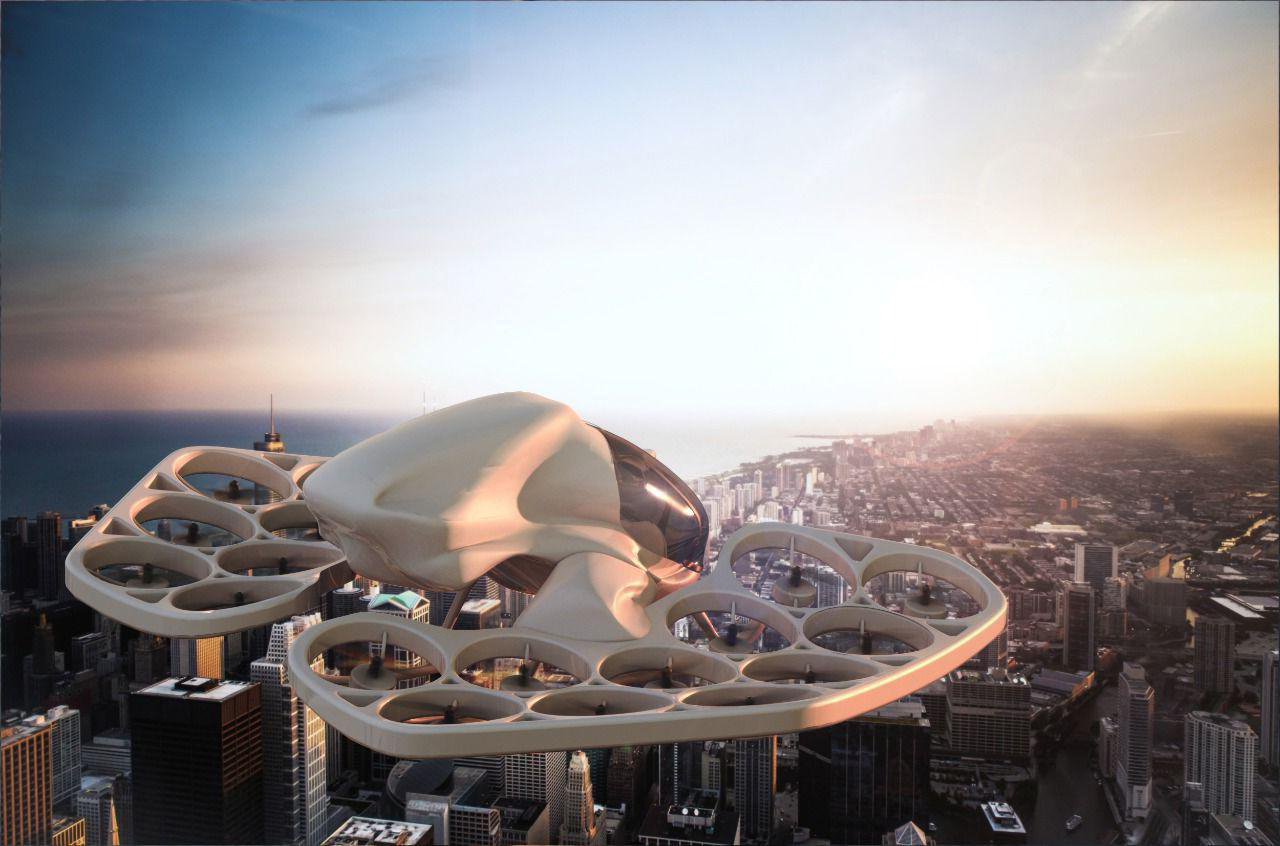 Flyka eVTOL aircraft in a front-side view over a sunset city skyline, its full ring cluster of 22 ducted-fan motor units clearly visible